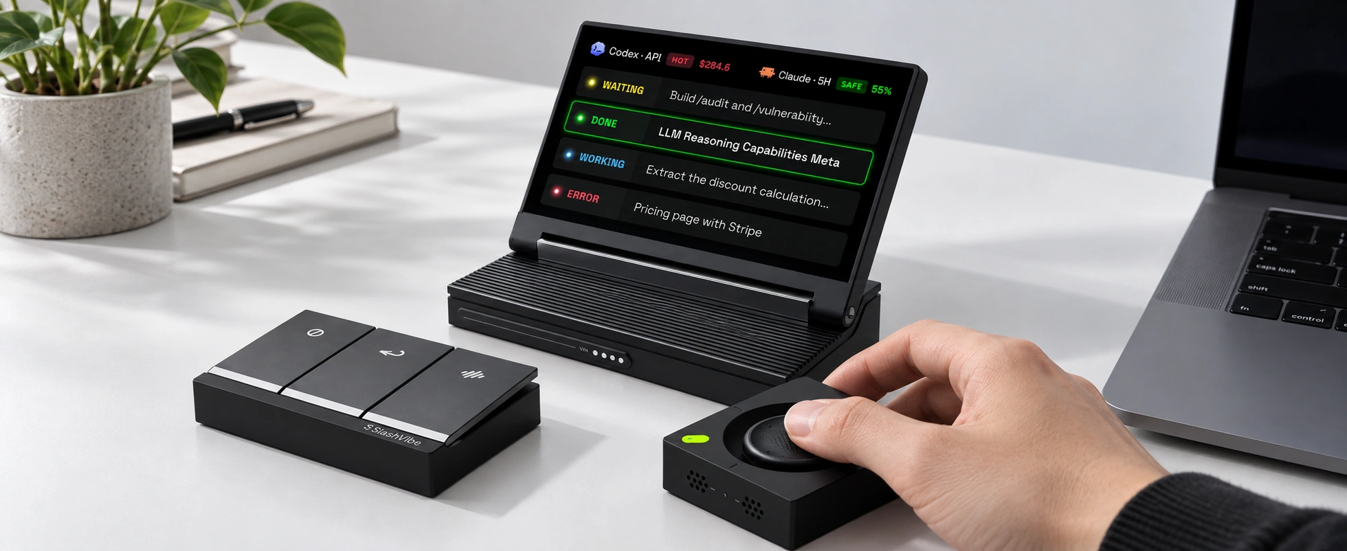 A thumb naturally operating the SlashVibe joystick on a desk.